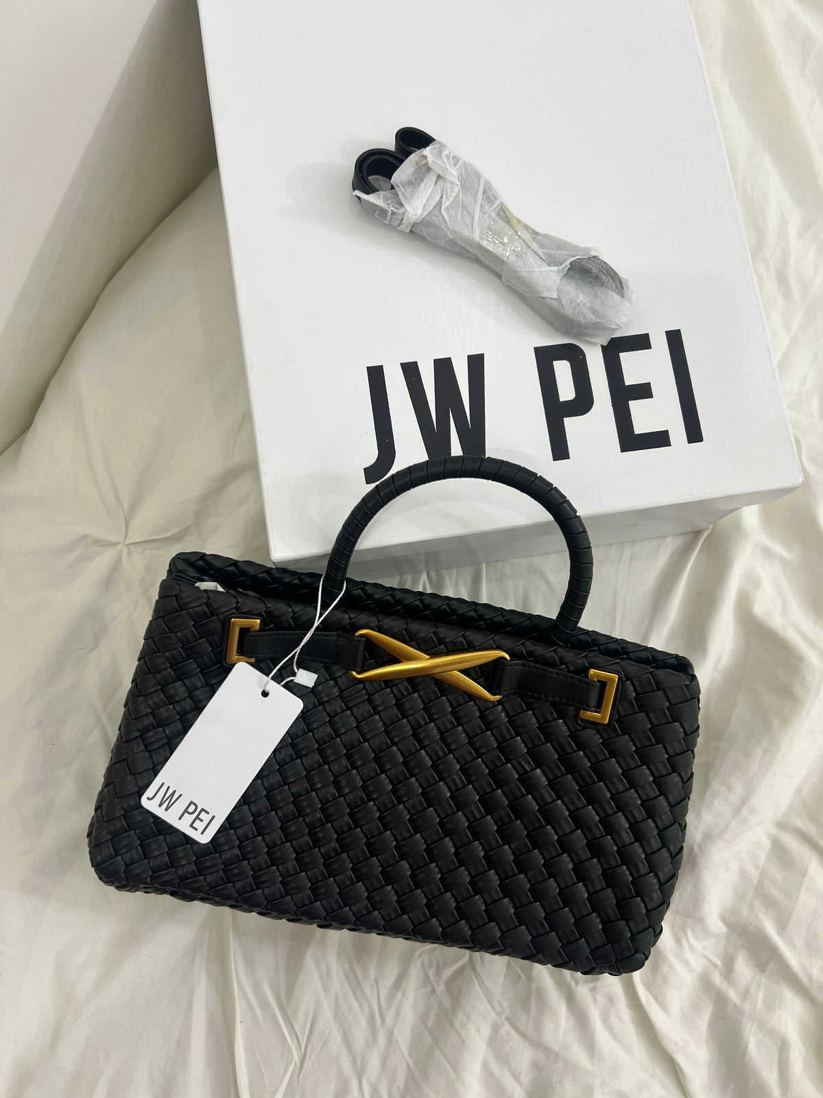 JWPEI INSPIRED in Black (with box and strap)